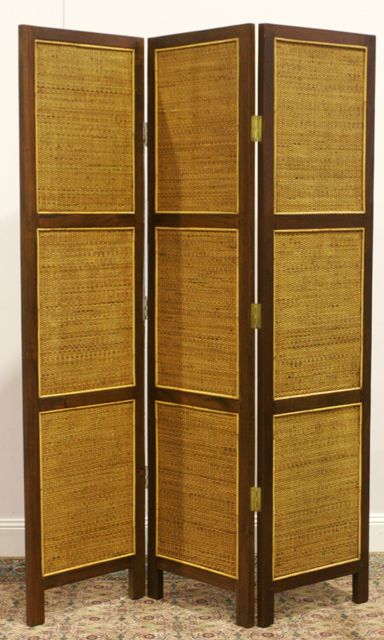 Appraisal: A stained pine and caned three-panel screen each panel cm