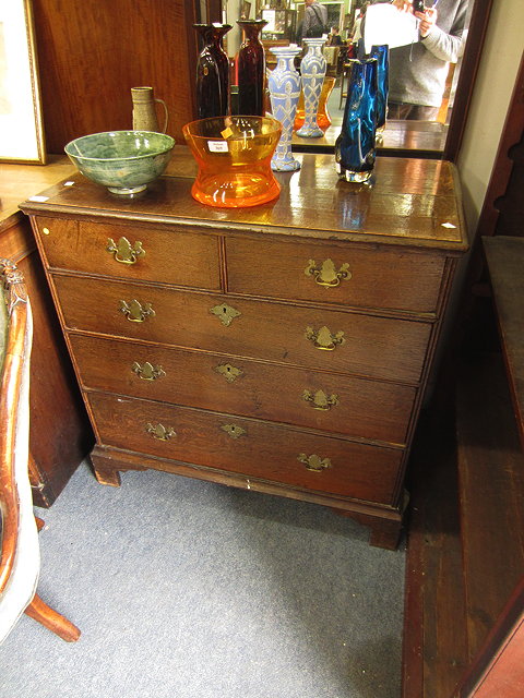 Appraisal: A GEORGIAN OAK CHEST of two short and three long