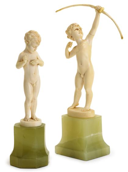 Appraisal: Pair of Continental ivory models on green onyx stands early