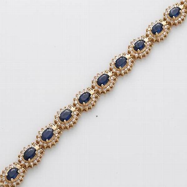 Appraisal: A diamond sapphire and k gold bracelet estimated total diamond