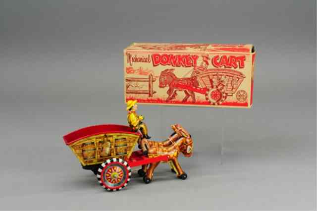 Appraisal: MARX BOXED DONKEY CART Lithographed tin strong key wind action