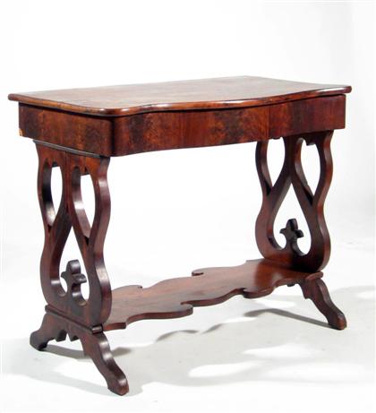 Appraisal: Mahogany sofa table Serpentine top over pierced supports joined by