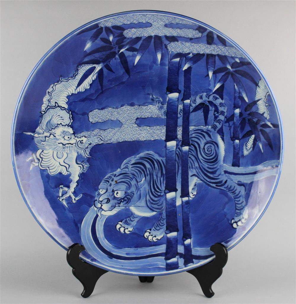 Appraisal: JAPANESE ARITA CHARGER WITH DRAGON AND TIGER MEIJI PERIOD underglaze