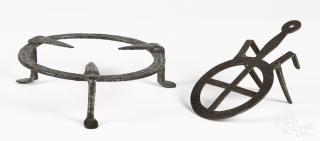 Appraisal: Two wrought iron trivets th c '' x '' and