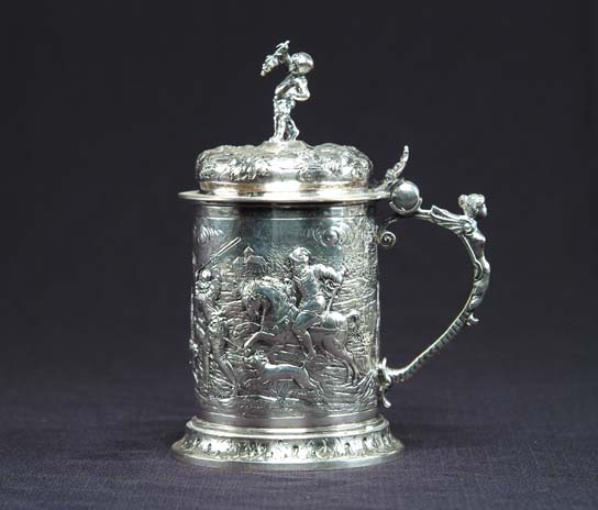 Appraisal: OUTSTANDING CONTINENTAL SILVER TANKARD Small tankard has relief scene of