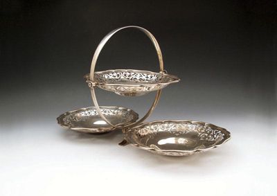 Appraisal: A three-tier folding silver cake stand by J Vickery Birmingham