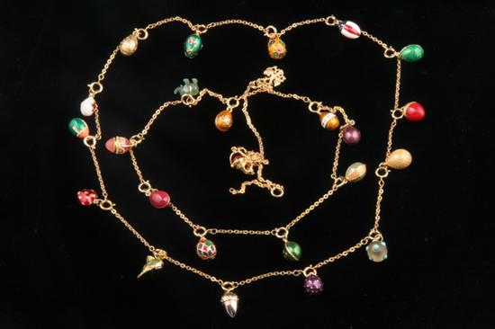 Appraisal: TWO JOAN RIVERS QUEEN OF ROMANIA FAUX FABERGE EGG NECKLACES