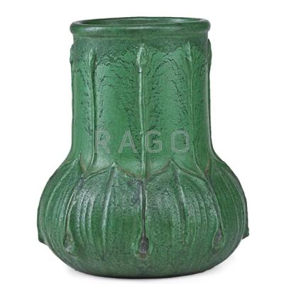 Appraisal: WHEATLEY Bulbous vase with leaves and buds curdled green glaze