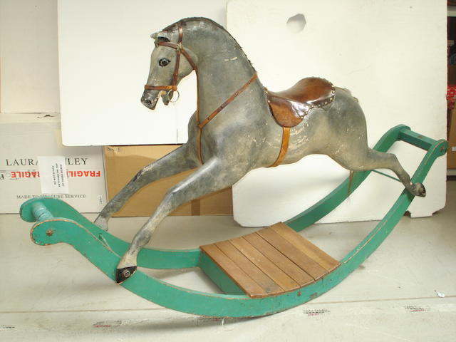 Appraisal: Early carved wooden Rocking horse English circa The painted grey