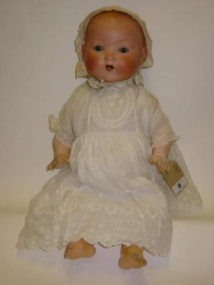 Appraisal: A German bisque head baby doll Dora with blue glass