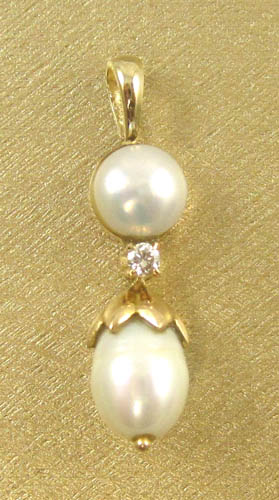 Appraisal: PEARL DIAMOND AND FOURTEEN KARAT GOLD PENDANT - inches in