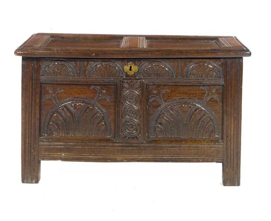 Appraisal: A JOINED OAK BLANKET CHEST with twin panelled lid in