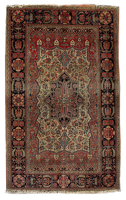 Appraisal: A PERSIAN SAROUK RUG with a red and blue ground