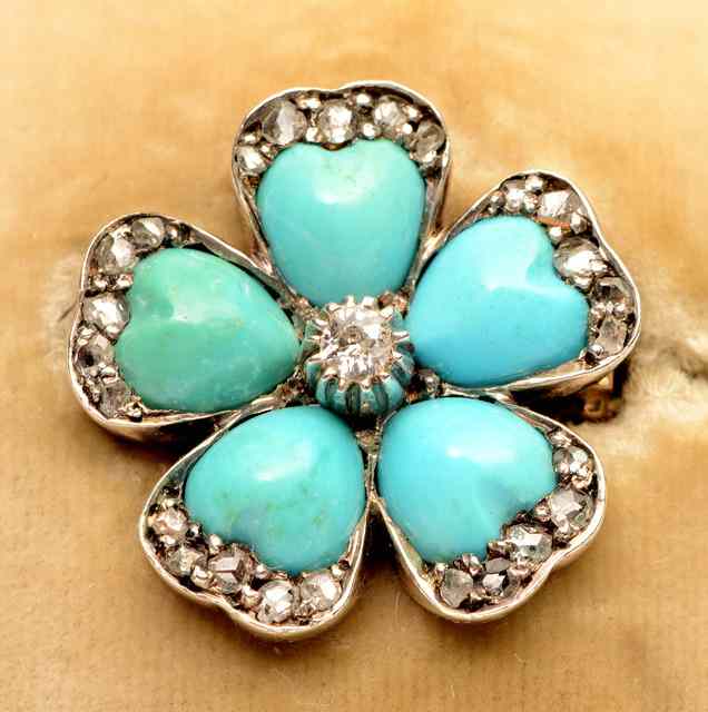 Appraisal: A TURQUOISE AND DIAMOND SET BROOCH in the form of