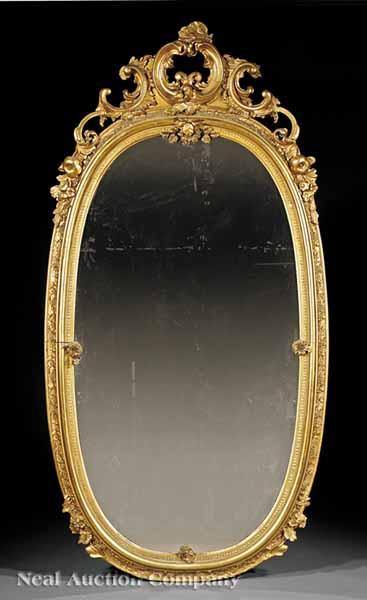 Appraisal: A Large Beaux Arts Giltwood Mirror late th c elaborate