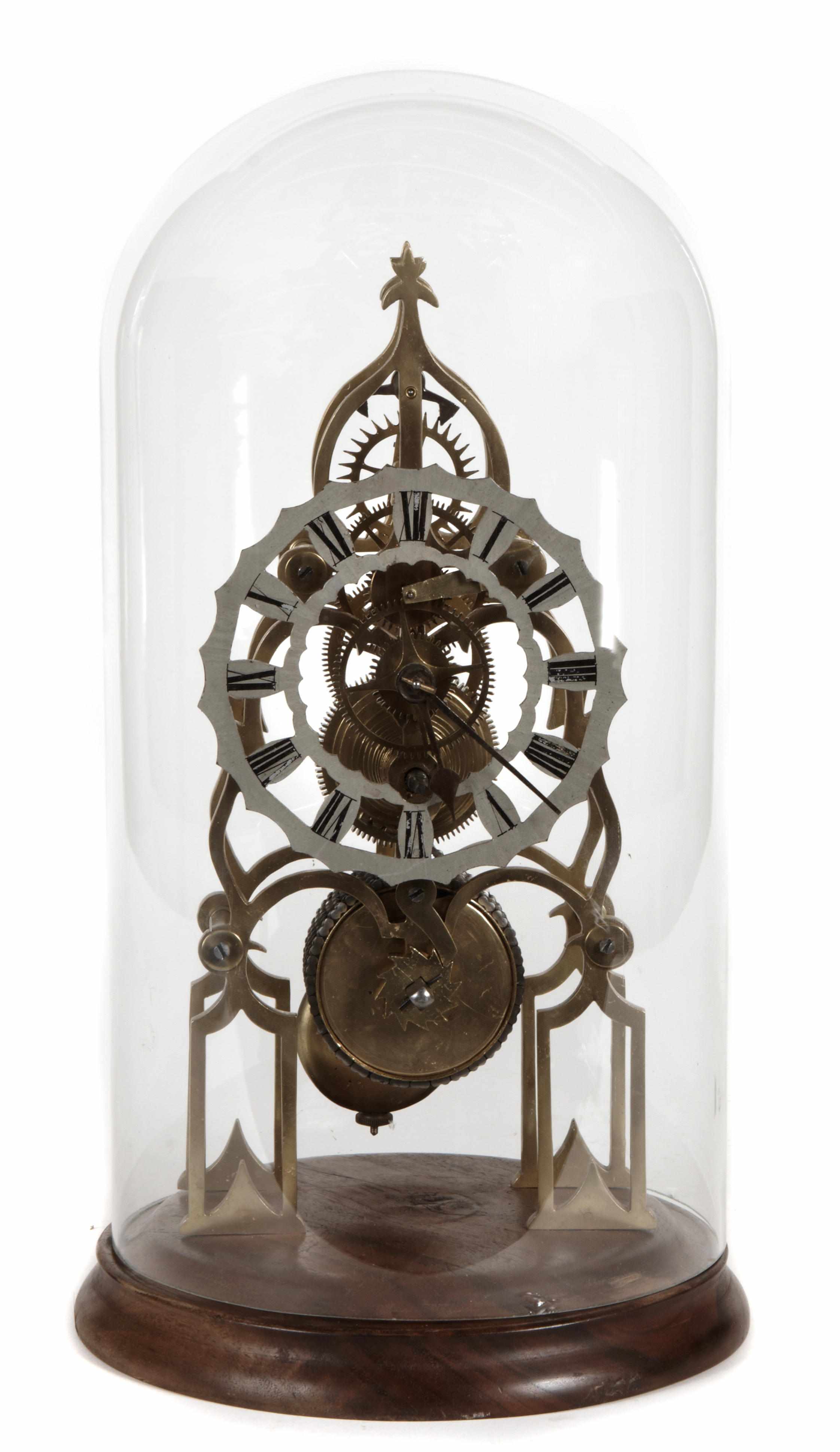 Appraisal: An English cut brass skeleton clock in a glass dome