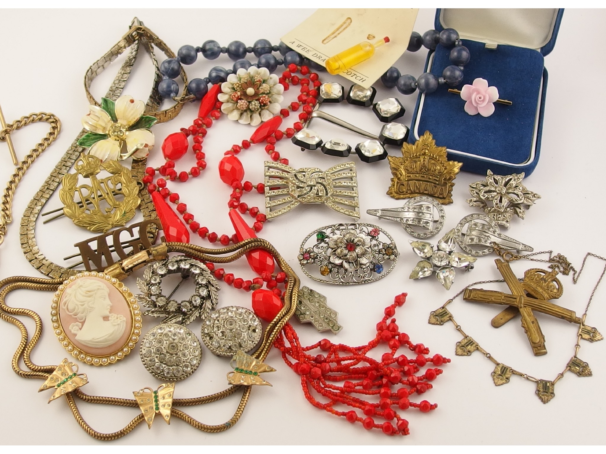 Appraisal: A collection of vintage costume jewellery to include some military