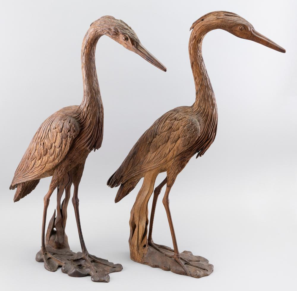 Appraisal: PAIR OF JAPANESE CARVED WOOD CRANES TH CENTURY HEIGHTS PAIR