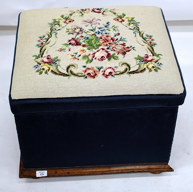 Appraisal: A VICTORIAN NEEDLEWORK AND BLUE DRALON UPHOLSTERED OTTOMAN STOOL together