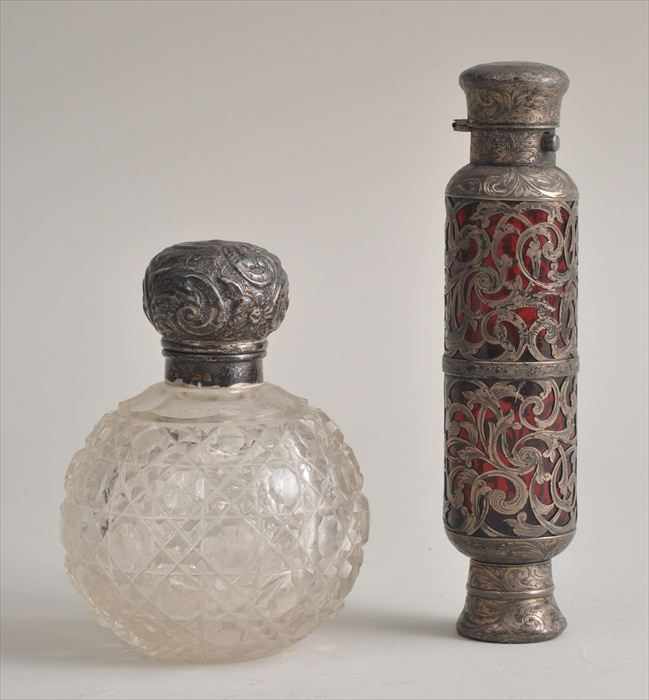 Appraisal: SILVER-MOUNTED RUBY GLASS SCENT VIAL AND AN ENGLISH SILVER-LIDDED CUT