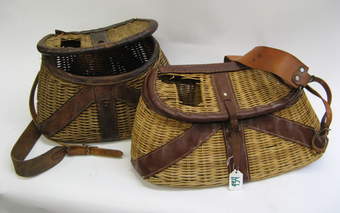 Appraisal: TWO WICKER AND LEATHER ACCENTED FISHING CREELS with shoulder straps