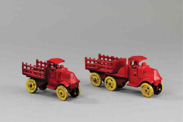 Appraisal: LOT OF TWO WALKER-STEWART MACK STAKE TRUCKS Includes one tractor