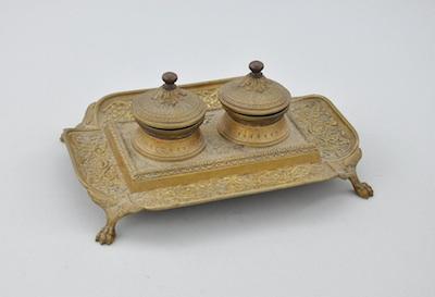 Appraisal: A Victorian Cast Brass Inkwell With two hinged lid receptacles