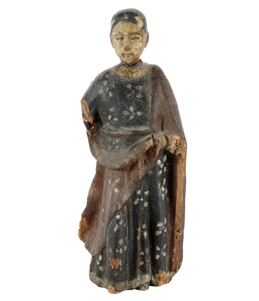 Appraisal: CARVED POLYCHROMED WOOD SANTO FIGUREwith detachable head Condition right arm