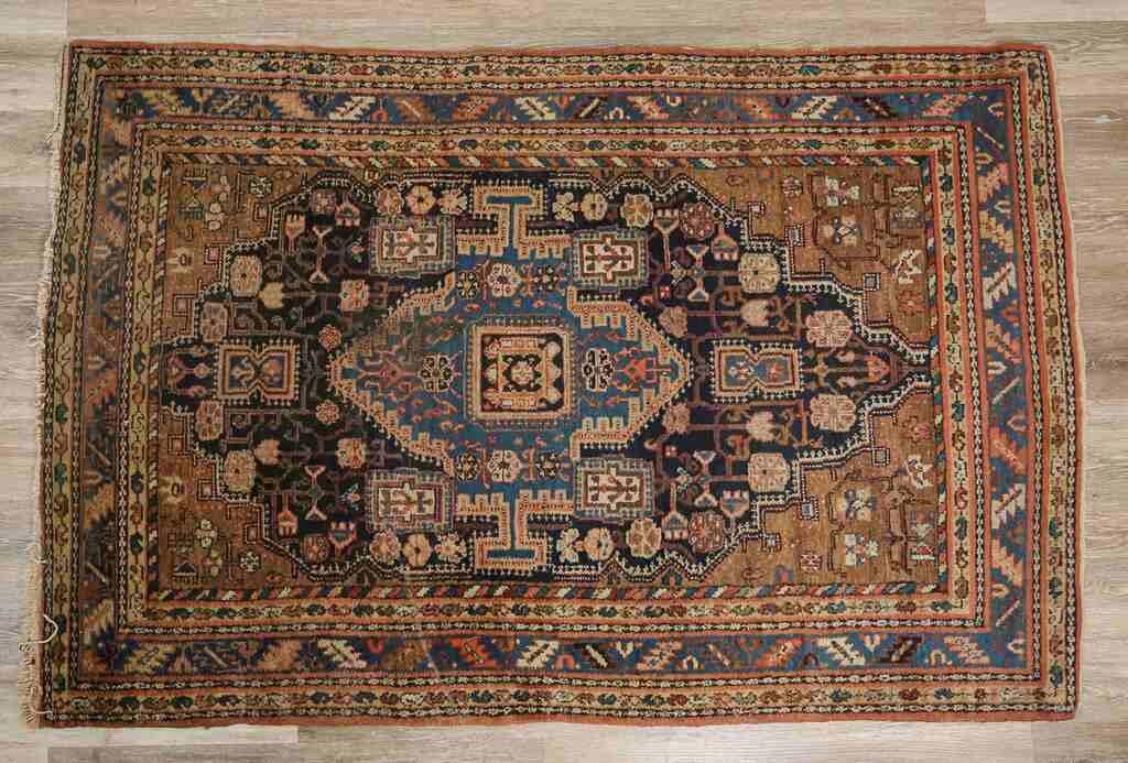 Appraisal: Caucasian rug th Century Geometric forms and diamond form medallion