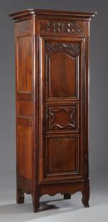 Appraisal: French Restoration Carved Walnut Bonnetiere early th c the stepped