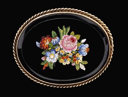 Appraisal: Floral micro mosaic brooch Oval onyx brooch with micro mosaic