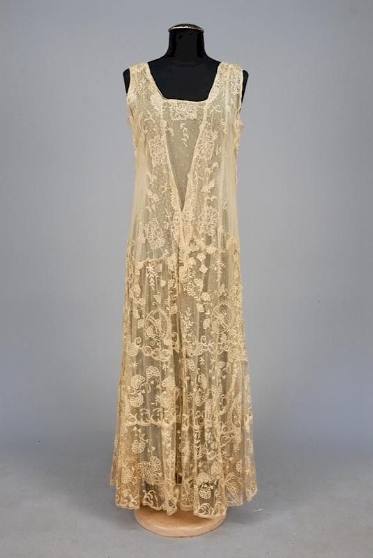 Appraisal: EMBROIDERED NET GOWN s Sleeveless cream net with square neckline