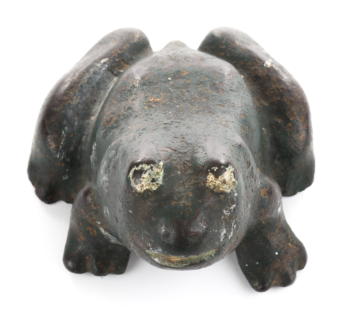 Appraisal: Cast iron frog doorstop late th century impressed J Curtin