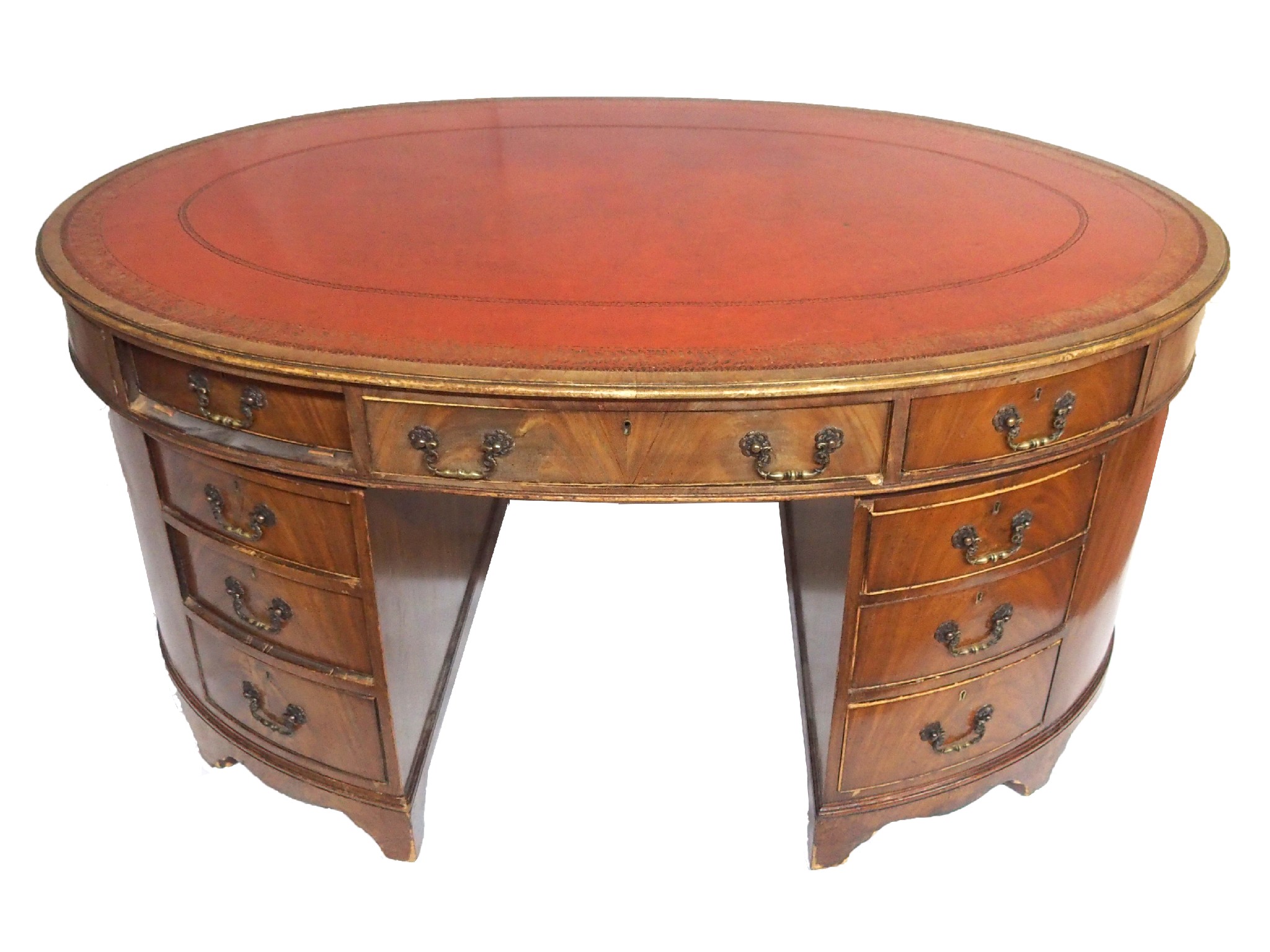 Appraisal: A mahogany oval twin pedestal library deskthe red and gilt