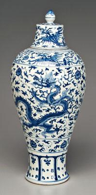 Appraisal: Chinese blue and white lidded vase meiping form robust dragons