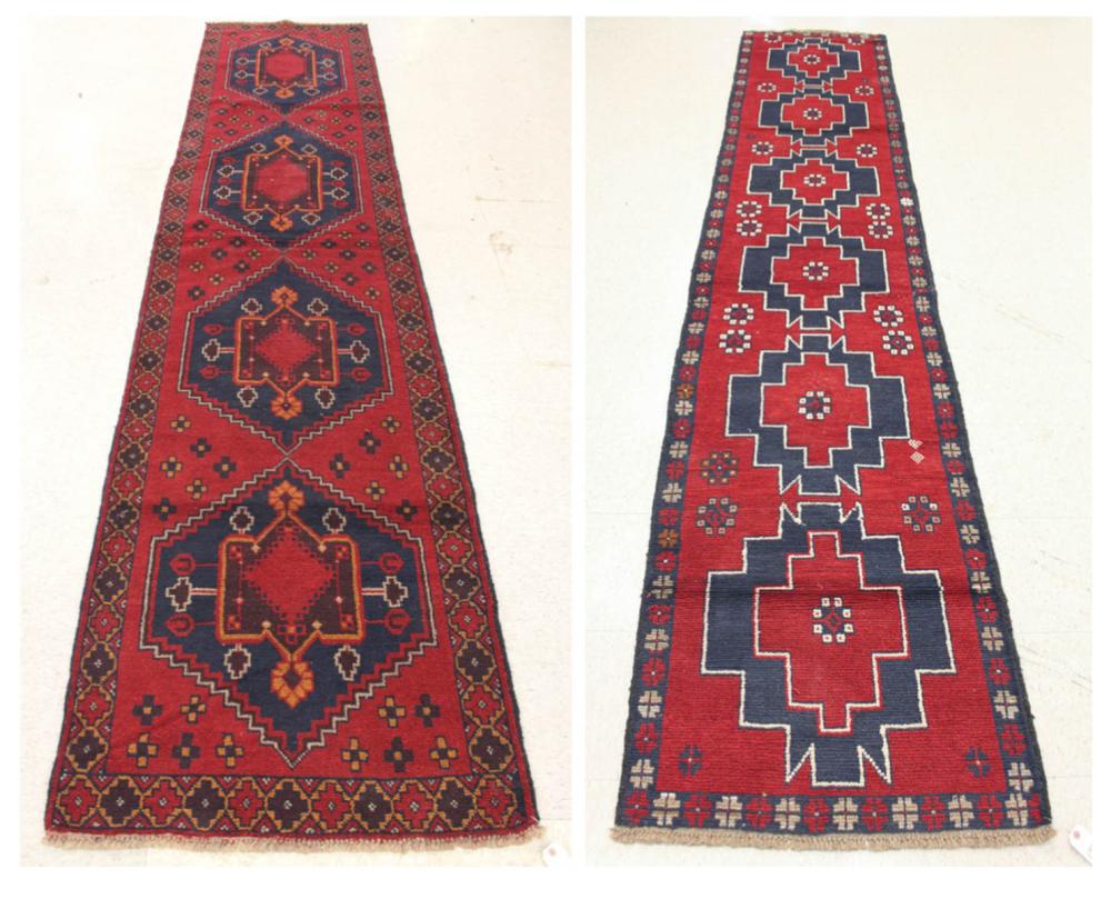 Appraisal: TWO HAND KNOTTED ORIENTAL RUNNERS Pakistani Persian tribals each featuring