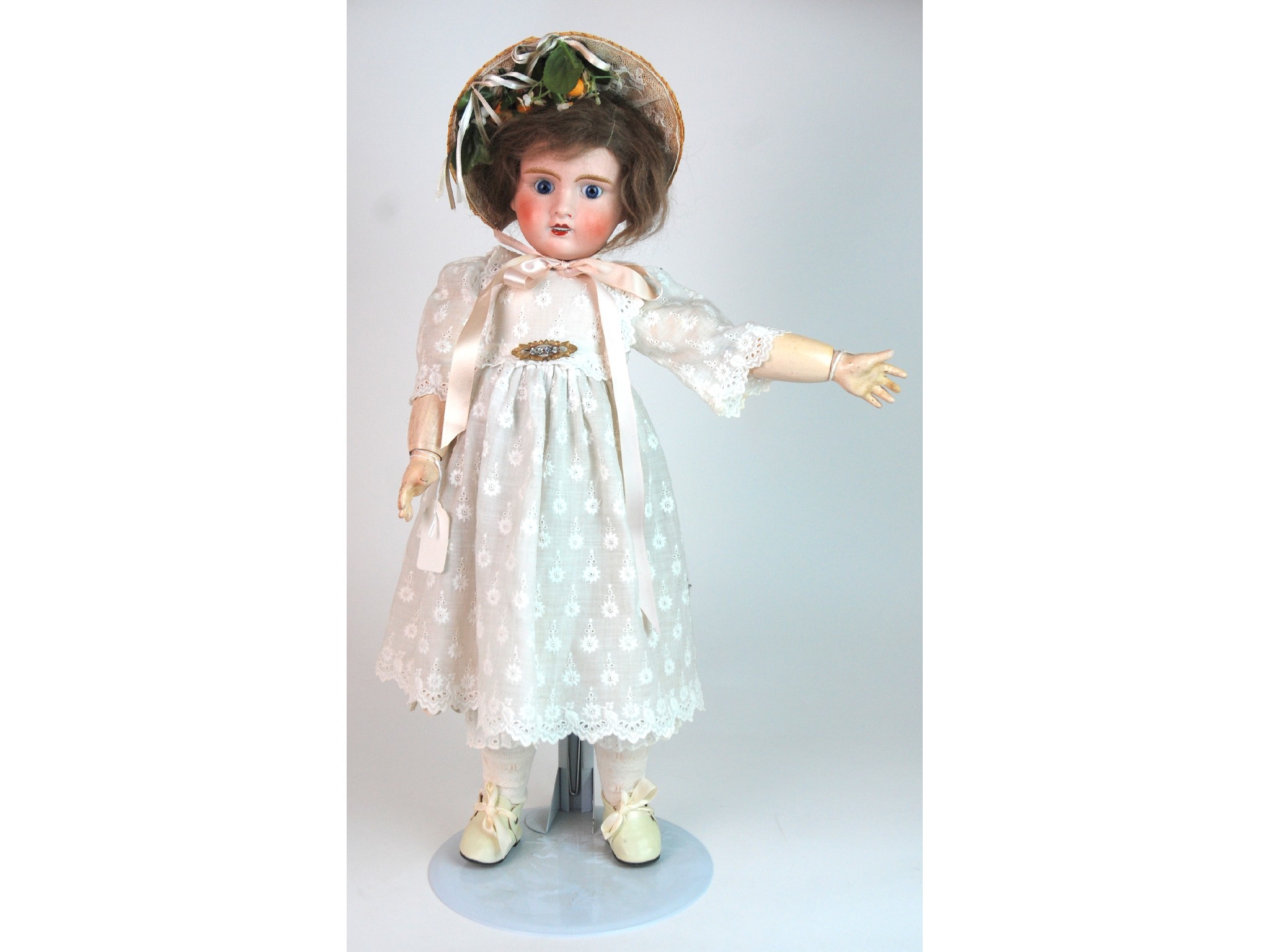 Appraisal: A Jules Verlingue Petite Francais bisque-headed dollwith fixed blue eyes