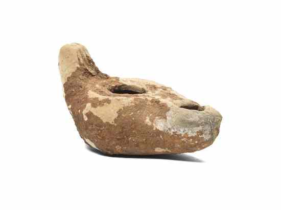 Appraisal: A Roman Terracotta Oil Lamp of typical form Width inches