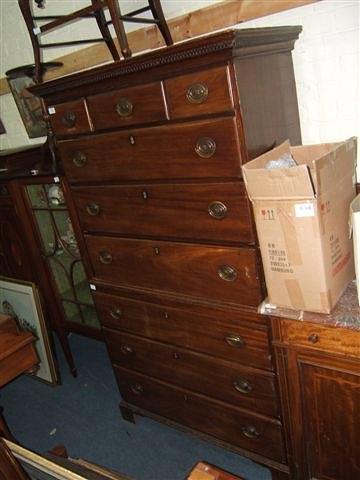 Appraisal: A th Century mahogany chest on chest with three drawers