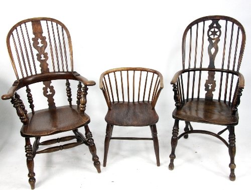 Appraisal: Two ash and elm high back Windsor armchairs and a