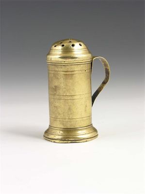 Appraisal: A th century brass bun top muffineer with a scroll