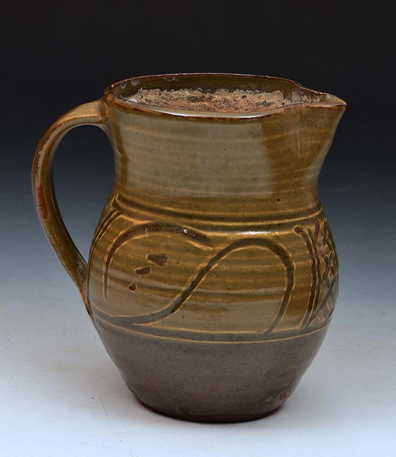 Appraisal: Michael Cardew British - at Wenford BridgeJug with dark-green glaze