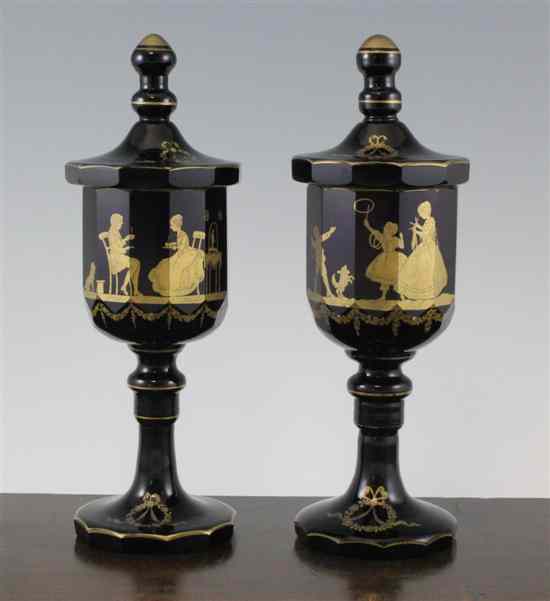 Appraisal: A pair of German or Bohemian amethyst and gilt glass