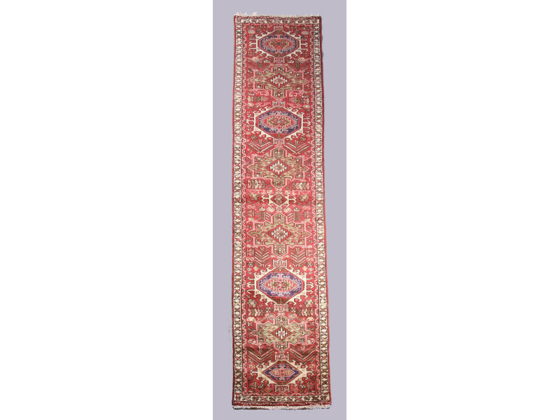 Appraisal: Heriz Runner cotton base red tones with ivory eight medallion