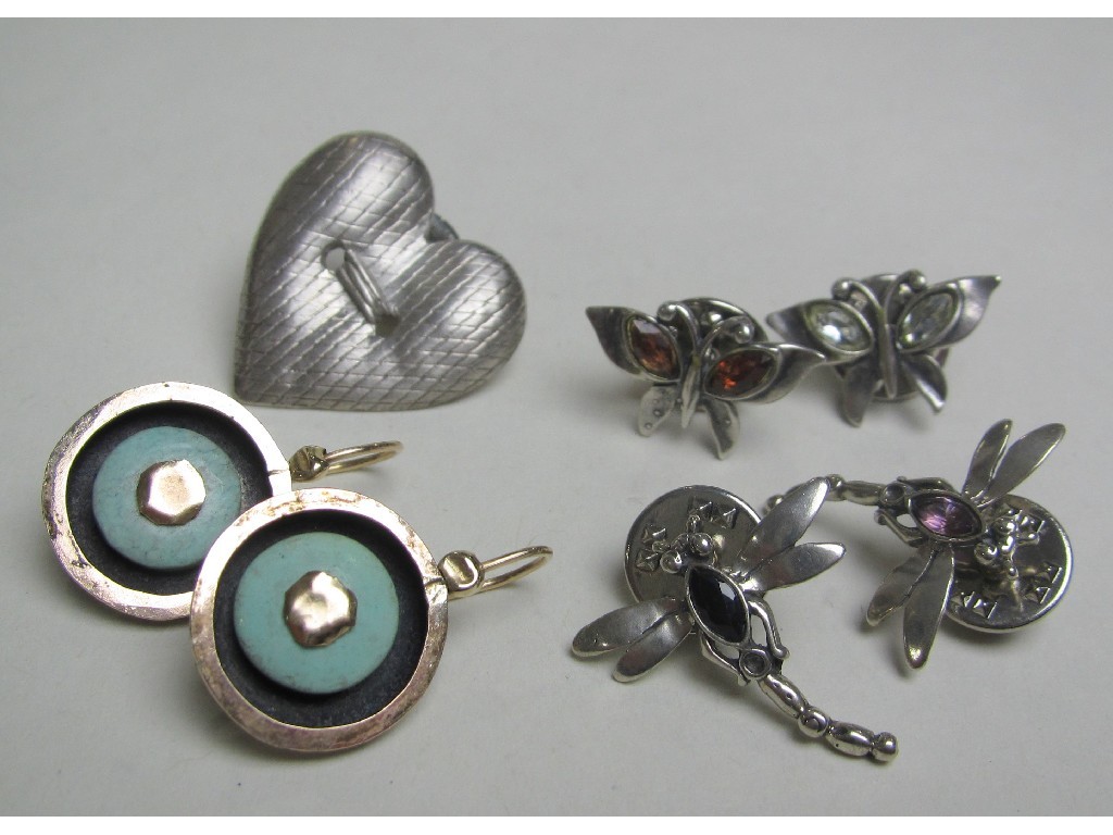 Appraisal: Lot comprising four gem set silver insect studs and one