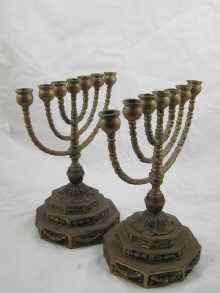 Appraisal: A pair of brass menorahs ht cm