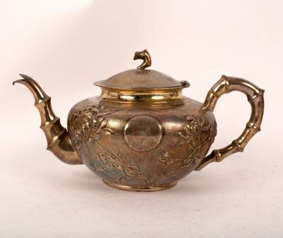 Appraisal: A Chinese export silver teapot circa with faux bamboo handle