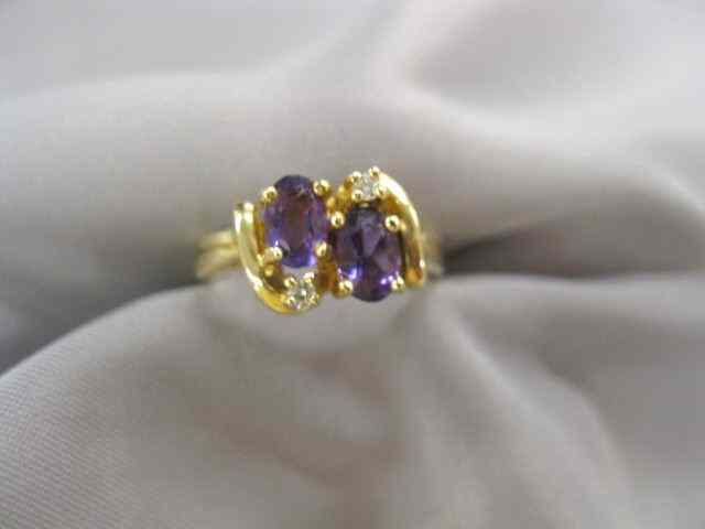 Appraisal: Amethyst Diamond Ring oval gems totaling carat and diamonds totaling