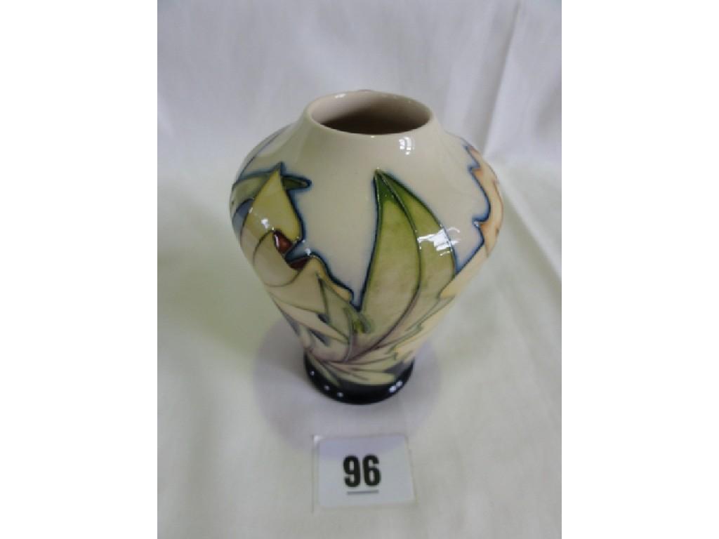 Appraisal: A small Moorcroft Pottery vase with yellow orchid type decoration