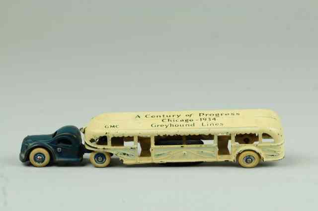 Appraisal: ARCADE GREYHOUND BUS C mid- 's cast iron tandem bus